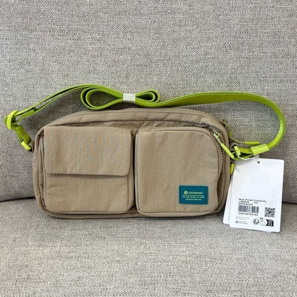 NWT Lululemon Multi Pocket Crossbody Bag In Sheer Oak/Sour Grape